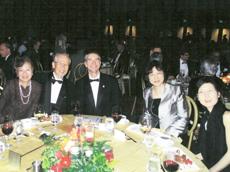 At the dinner with his family and fellow researchers. Professor Yamamoto is second from the left.